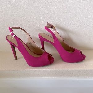 Faux suede, hot pink high heel sling backs.